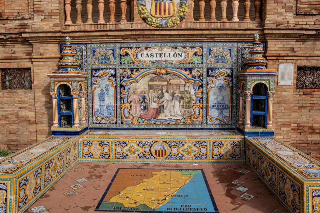 Decorative tiled bench with a Castellón city map and historical mural.